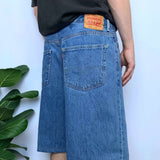 BAGGY LEVIS MID WASH JORTS - W36