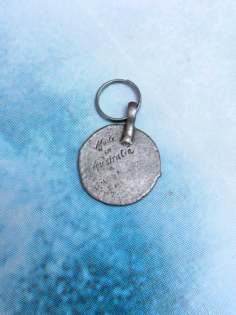 VINTAGE RIP CURL METAL KEYCHAIN