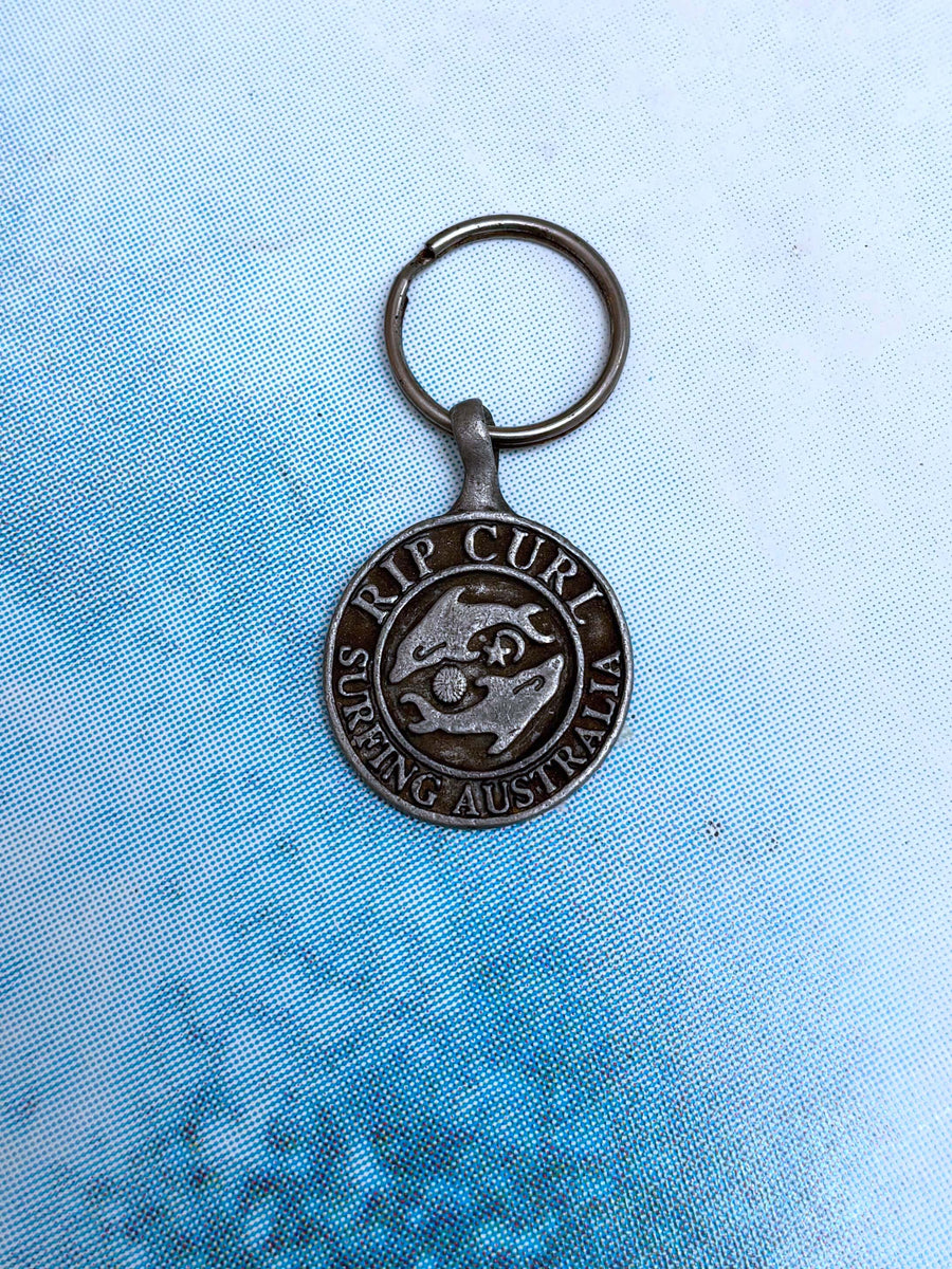 VINTAGE RIP CURL METAL DOLPHINS KEYCHAIN